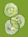 Three Slices of Cucumber on a Green Surface-Steven Morris-Photographic Print