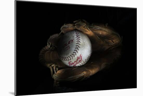 Still-Life Image of Baseball Nestled in a Mitt or Glove-Sheila Haddad-Mounted Photographic Print