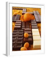 Still Life of Chocolate Bars and Citrus Fruit-Luzia Ellert-Framed Photographic Print