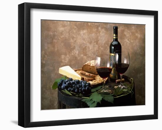 Still Life of Wine Bottle, Wine Glasses, Cheese and Purple Grapes on Top of Barrel-null-Framed Photographic Print