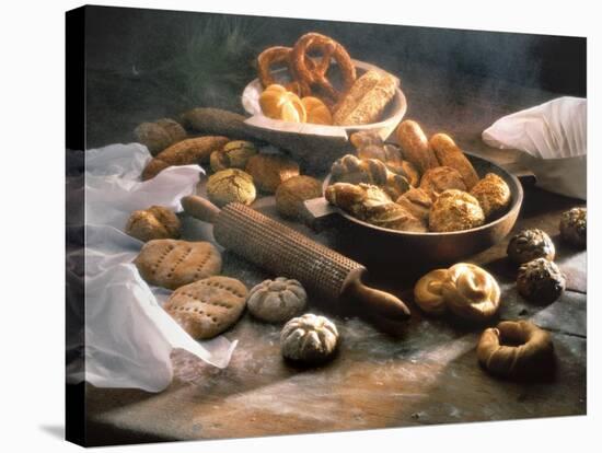Still Life with Assorted Rolls and Pretzels-null-Stretched Canvas
