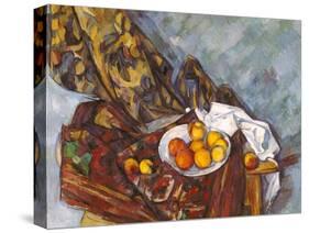 Still life with fruit in front of a floral curtain (Nature morte, rideau à fleurs, et fruits)-Paul Cézanne-Stretched Canvas