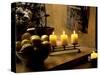 Still Life with Lighted Candles and Bowl of Lemons in Coffee Shop, Tallinn, Estonia-Nancy & Steve Ross-Stretched Canvas