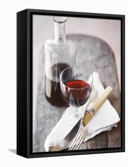 Still Life with Red Wine Glass, Wine Carafe, Napkin and Cutlery-Jean Cazals-Framed Stretched Canvas