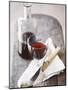 Still Life with Red Wine Glass, Wine Carafe, Napkin and Cutlery-Jean Cazals-Mounted Photographic Print