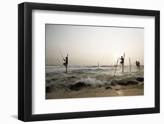 Stilt fisherman in Sri Lanka-Rasmus Kaessmann-Framed Photographic Print