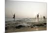 Stilt fisherman in Sri Lanka-Rasmus Kaessmann-Mounted Photographic Print