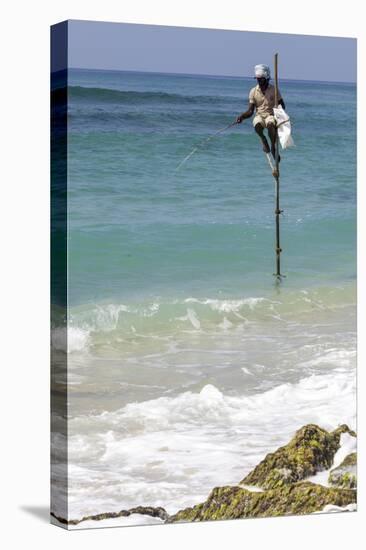 Stilt Fisherman Using Traditional Fishing Techniques on a Wooden Pole-Charlie-Stretched Canvas