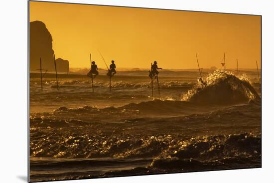 Stilt Fishermen at Sunrise-Alex Saberi-Mounted Photographic Print