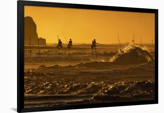 Stilt Fishermen at Sunrise-Alex Saberi-Framed Photographic Print