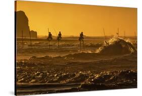 Stilt Fishermen at Sunrise-Alex Saberi-Stretched Canvas