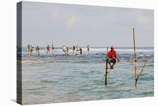 Stilt Fishermen, Dalawella, Sri Lanka, Indian Ocean, Asia-Christian Kober-Stretched Canvas