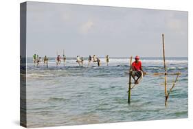 Stilt Fishermen, Dalawella, Sri Lanka, Indian Ocean, Asia-Christian Kober-Stretched Canvas