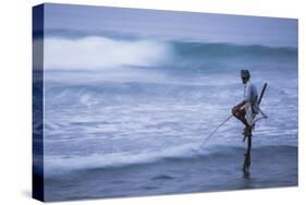 Stilt Fishing, a Stilt Fisherman in the Waves at Midigama Near Weligama, South Coast-Matthew Williams-Ellis-Stretched Canvas