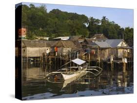 Stilt Houses and Catamaran Fishing Boat, Coron Town, Busuanga Island, Palawan Province, Philippines-Kober Christian-Stretched Canvas