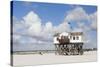Stilt Houses on a Beach-Markus Lange-Stretched Canvas