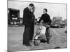 Stirling Moss on a Vespa Scooter, Goodwood, April 1952-null-Mounted Photographic Print