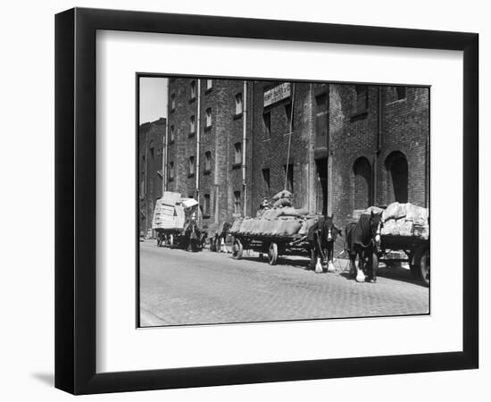 Stock Is Unloaded from Horse- Pulled Wagons and Drawn Up into the Warehouse by Rope-null-Framed Photographic Print