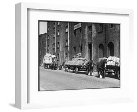 Stock Is Unloaded from Horse- Pulled Wagons and Drawn Up into the Warehouse by Rope-null-Framed Photographic Print