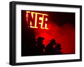 Stockmen Watch the Opening Ceremonies of the National Finals Rodeo-null-Framed Premium Photographic Print