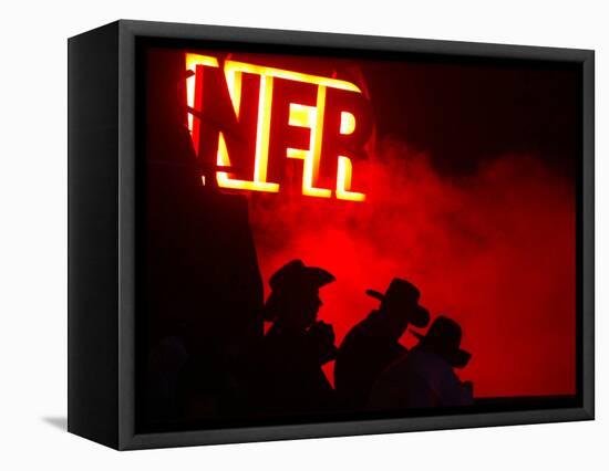 Stockmen Watch the Opening Ceremonies of the National Finals Rodeo-null-Framed Stretched Canvas