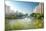 Stone bridge with pagoda style roofing, flanked by old style apartment buildings on the left and ne-Andreas Brandl-Mounted Photographic Print