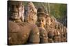 Stone Carved Statues of Devas on the Bridge to Angkor Thom in Angkor Complex, Siem Reap, Cambodia-mazzzur-Stretched Canvas