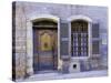 Stone Doorway with Wooden Door and Metal Knocker, Arles, France-Jim Zuckerman-Stretched Canvas