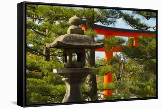 Stone lantern and Torii gate in Fushimi Inari Shrine, Kyoto, Japan-Keren Su-Framed Stretched Canvas