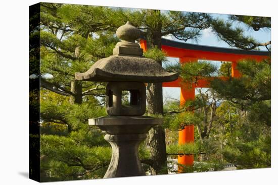 Stone lantern and Torii gate in Fushimi Inari Shrine, Kyoto, Japan-Keren Su-Stretched Canvas