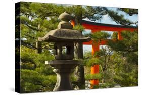 Stone lantern and Torii gate in Fushimi Inari Shrine, Kyoto, Japan-Keren Su-Stretched Canvas