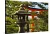 Stone lantern and Torii gate in Fushimi Inari Shrine, Kyoto, Japan-Keren Su-Stretched Canvas