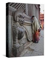 Stone Lions Guard a Prayer Wall in Durbar Square, Kathmandu, Nepal, Asia-Mark Chivers-Stretched Canvas