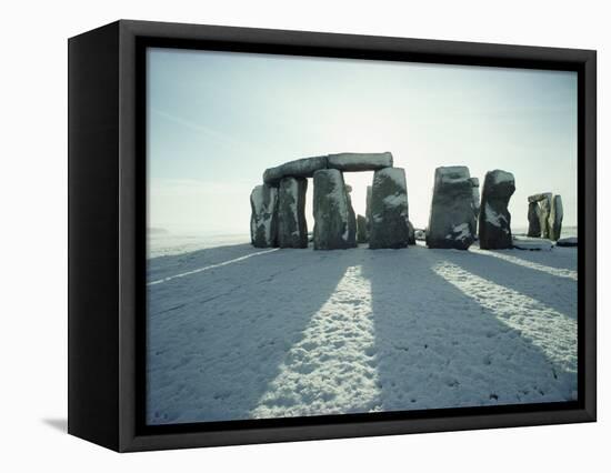 Stonehenge, Unesco World Heritage Site, in Winter Snow, Wiltshire, England, United Kingdom, Europe-Adam Woolfitt-Framed Stretched Canvas