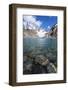 Stones seen through the water of Lago de los Tres featuring Monte Fitz Roy in the background, Patag-Fernando Carniel Machado-Framed Photographic Print