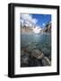 Stones seen through the water of Lago de los Tres featuring Monte Fitz Roy in the background, Patag-Fernando Carniel Machado-Framed Photographic Print