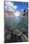 Stones seen through the water of Lago de los Tres featuring Monte Fitz Roy in the background, Patag-Fernando Carniel Machado-Mounted Photographic Print