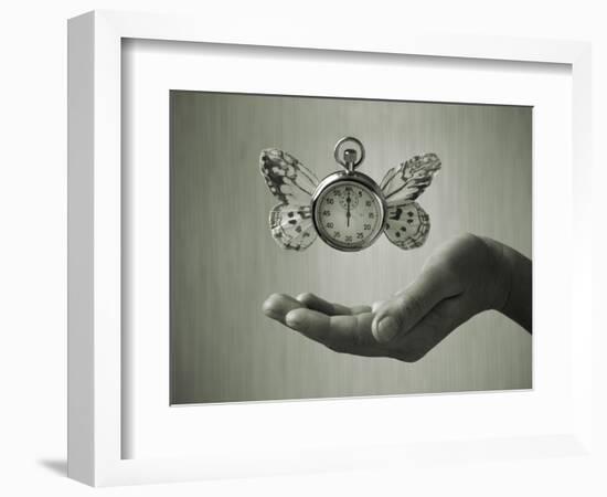 Stopwatch With Butterfly Wings Levitating Above Hand, Black And White, Slight Green Toning-foodbytes-Framed Art Print