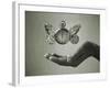 Stopwatch With Butterfly Wings Levitating Above Hand, Black And White, Slight Green Toning-foodbytes-Framed Art Print