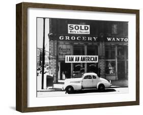 Store Sign Reads, "I am an American," After Pearl Harbor Attack, and "Sold", Following Evacuation-Dorothea Lange-Framed Photographic Print