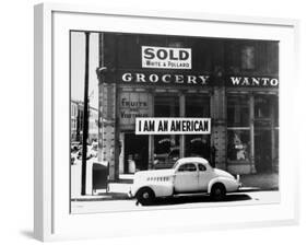 Store Sign Reads, "I am an American," After Pearl Harbor Attack, and "Sold", Following Evacuation-Dorothea Lange-Framed Photographic Print