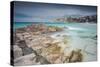 Storm clouds frame the village overlooking the turquoise sea, Santa Teresa di Gallura, Italy-Roberto Moiola-Stretched Canvas