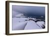 Storm clouds on the snowy peaks reflected in the cold sea at night, Haukland, Northern Norway-Roberto Moiola-Framed Photographic Print