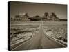 Straight Road Cutting Through Landscape of Monument Valley, Utah, USA-Gavin Hellier-Stretched Canvas