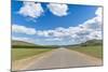 Straight road in the Mongolian steppe and clouds in the sky, North Hangay province, Mongolia, Centr-Francesco Vaninetti-Mounted Photographic Print