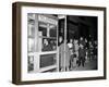 Stranded New York Workers Wait Patiently in a Long Line to Use a Phone Booth to Call Home-null-Framed Premium Photographic Print