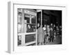 Stranded New York Workers Wait Patiently in a Long Line to Use a Phone Booth to Call Home-null-Framed Premium Photographic Print