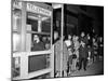 Stranded New York Workers Wait Patiently in a Long Line to Use a Phone Booth to Call Home-null-Mounted Premium Photographic Print