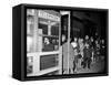 Stranded New York Workers Wait Patiently in a Long Line to Use a Phone Booth to Call Home-null-Framed Stretched Canvas