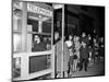 Stranded New York Workers Wait Patiently in a Long Line to Use a Phone Booth to Call Home-null-Mounted Photographic Print